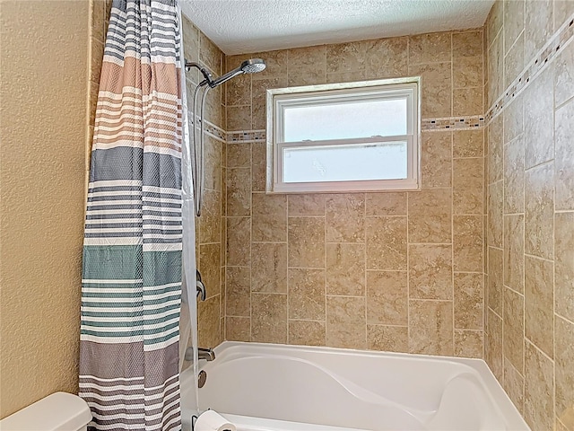 4921 Marlin Dr, New Port Richey, FL 34652 - full bath featuring a textured wall, shower / tub combo, a textured ceiling, and toilet
