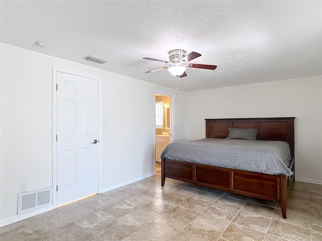 4921 Marlin Dr, New Port Richey, FL 34652 - bedroom with visible vents, baseboards, a ceiling fan, and a textured ceiling