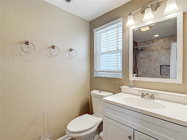 4921 Marlin Dr, New Port Richey, FL 34652 - full bath with vanity, a textured wall, a textured ceiling, a shower with curtain, and toilet