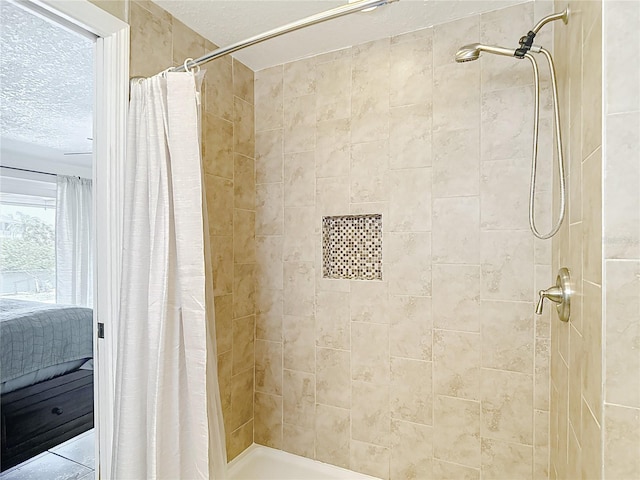 4921 Marlin Dr, New Port Richey, FL 34652 - ensuite bathroom featuring ensuite bathroom, a stall shower, and a textured ceiling