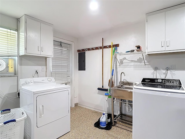 4921 Marlin Dr, New Port Richey, FL 34652 - clothes washing area featuring baseboards, electric panel, a sink, cabinet space, and washing machine and dryer