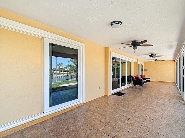 4921 Marlin Dr, New Port Richey, FL 34652 - unfurnished sunroom featuring a water view