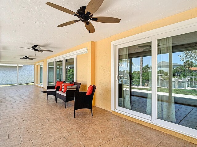 4921 Marlin Dr, New Port Richey, FL 34652 - sunroom with a textured ceiling, a healthy amount of sunlight, and a textured wall