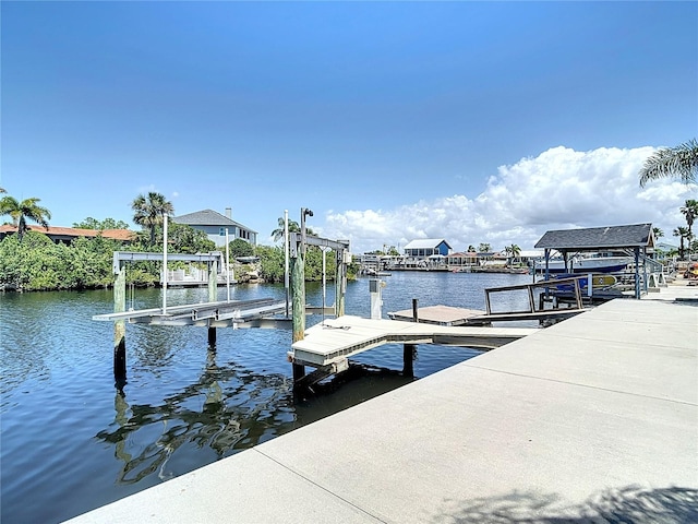 4921 Marlin Dr, New Port Richey, FL 34652 - view of dock featuring a water view and boat lift