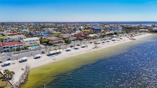 4921 Marlin Dr, New Port Richey, FL 34652 - drone / aerial view featuring a water view and a view of the beach
