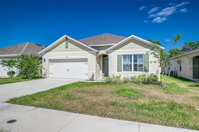 single story home featuring central AC unit, stucco siding, concrete driveway, a front yard, and a garage