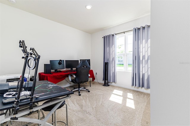 carpeted office space with baseboards