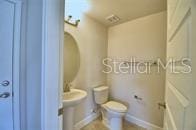bathroom featuring toilet