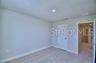 unfurnished bedroom featuring baseboards