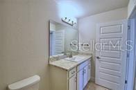 half bath with toilet and vanity