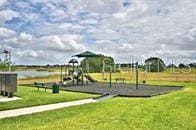 community playground with a lawn