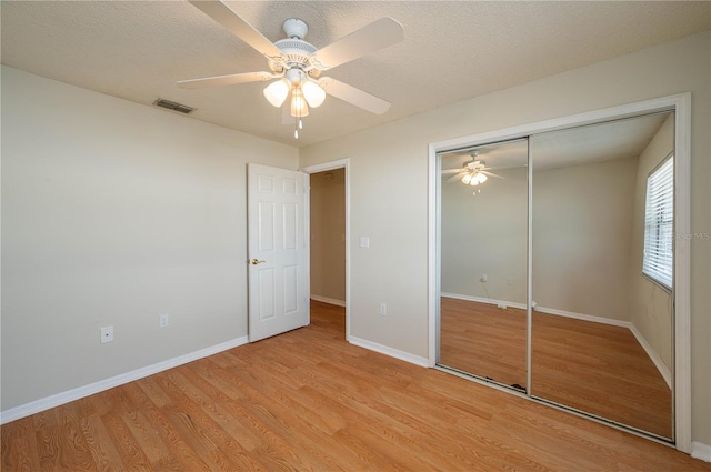 6315 Conductor Ct, Lakeland, FL 33813 - unfurnished bedroom featuring baseboards, visible vents, and light wood-style floors