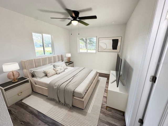 2527 Dons Pl, Lakeland, FL 33801 - bedroom with wood finished floors and a ceiling fan