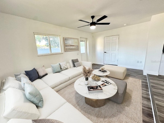 2527 Dons Pl, Lakeland, FL 33801 - living area featuring wood finished floors, baseboards, and a ceiling fan