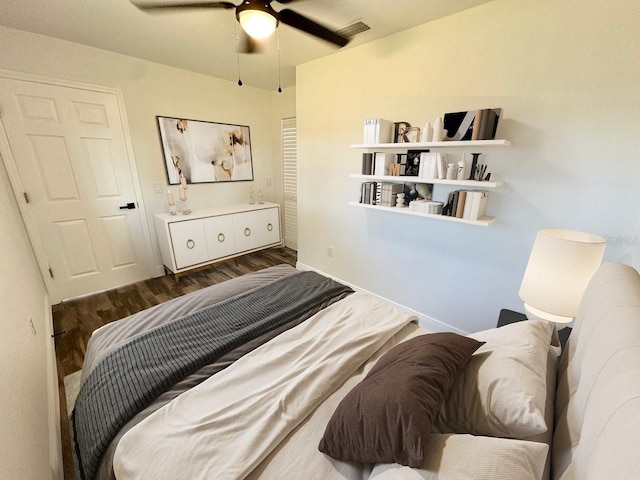 2527 Dons Pl, Lakeland, FL 33801 - bedroom featuring wood finished floors, ceiling fan, and baseboards