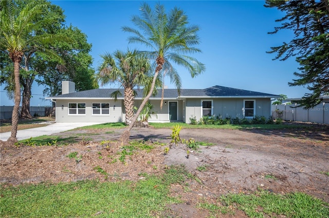 1502 Edgewater Beach Dr, Lakeland, FL 33805 - single story home with fence and a chimney