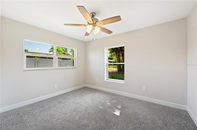 1502 Edgewater Beach Dr, Lakeland, FL 33805 - carpeted spare room with ceiling fan and baseboards