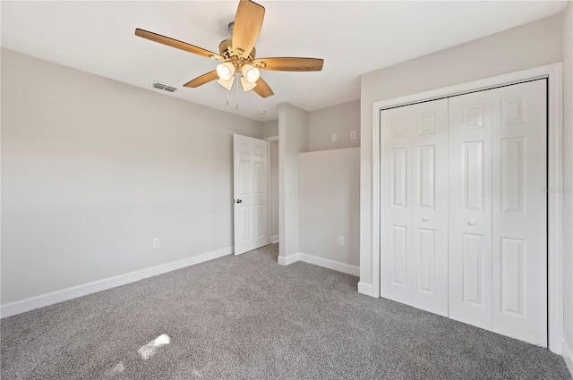 1502 Edgewater Beach Dr, Lakeland, FL 33805 - unfurnished bedroom featuring visible vents, baseboards, a closet, a ceiling fan, and carpet floors