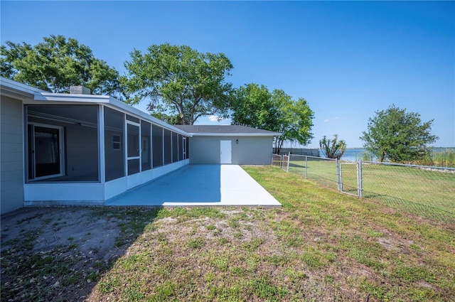 1502 Edgewater Beach Dr, Lakeland, FL 33805 - view of yard featuring fence, a patio, and a sunroom