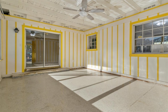 unfurnished sunroom featuring ceiling fan, beamed ceiling, and visible vents