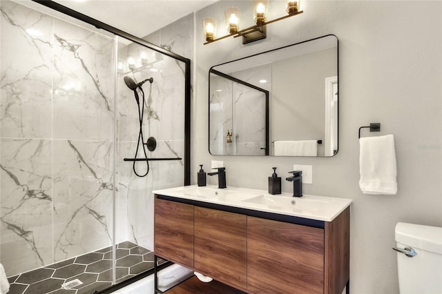 13032 Cumberland Dr, Largo, FL 33773 - bathroom featuring a marble finish shower, a sink, double vanity, toilet, and a notable chandelier
