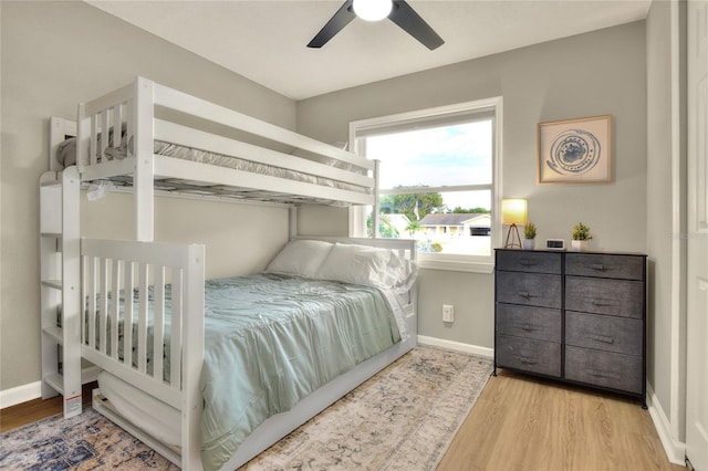 13032 Cumberland Dr, Largo, FL 33773 - bedroom with baseboards, a ceiling fan, and wood finished floors