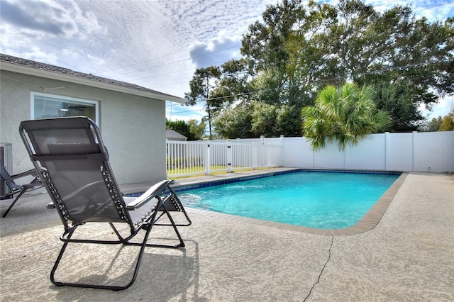 13032 Cumberland Dr, Largo, FL 33773 - view of pool with fence, a fenced in pool, and a patio