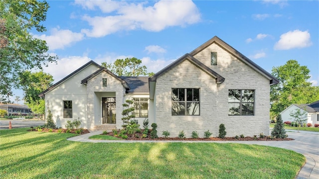 5087 Cliffside Dr, Lakeland, FL 33813 - view of front of house with stone siding and a front lawn