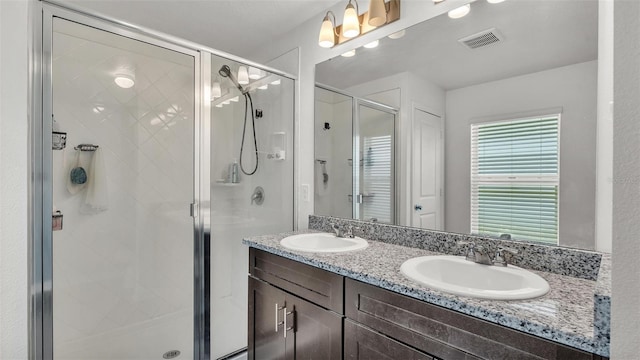 613 Sarner Pass Way, Winter Haven, FL 33881 - full bathroom featuring double vanity and a shower stall