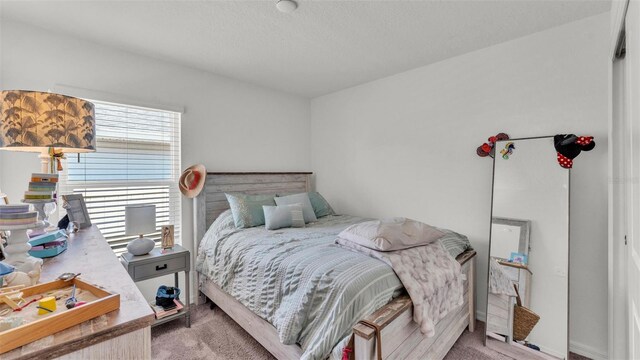 613 Sarner Pass Way, Winter Haven, FL 33881 - bedroom featuring light colored carpet