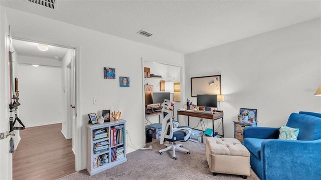 613 Sarner Pass Way, Winter Haven, FL 33881 - home office with baseboards and wood finished floors