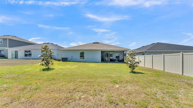 613 Sarner Pass Way, Winter Haven, FL 33881 - back of house featuring stucco siding