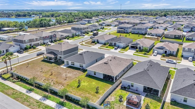 613 Sarner Pass Way, Winter Haven, FL 33881 - aerial view of residential area with a large body of water