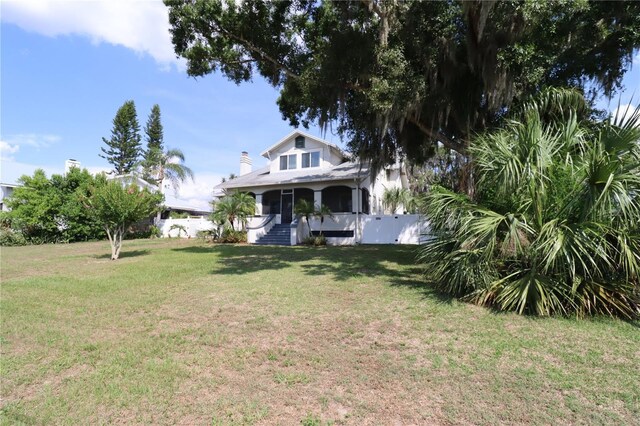 934 Lake Elbert Dr SE, Winter Haven, FL 33880 - view of yard with a porch