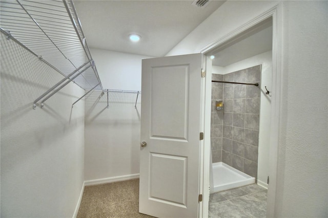 spacious closet featuring visible vents