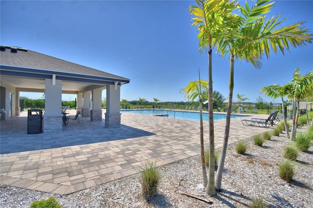community pool with a patio