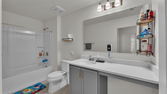bathroom with washtub / shower combination, visible vents, toilet, and vanity