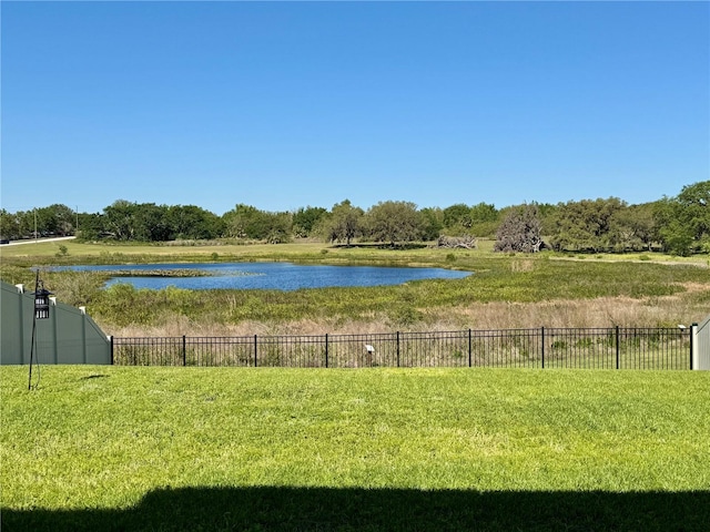 view of water feature with fence