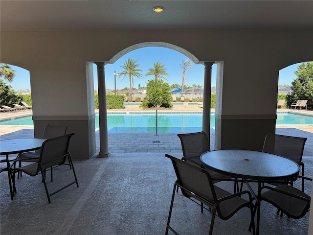 view of patio / terrace with a community pool