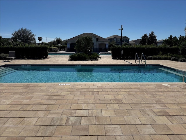 pool featuring a patio area