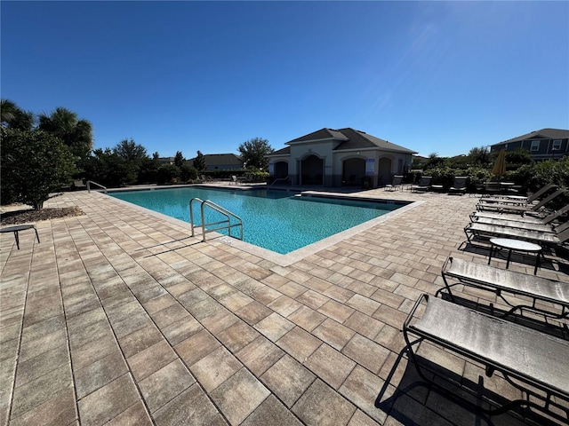 community pool featuring a patio