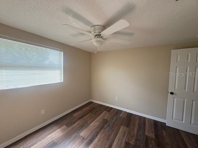 4830 Melody Ln, Lakeland, FL 33805 - spare room featuring a ceiling fan, wood finished floors, and a textured ceiling