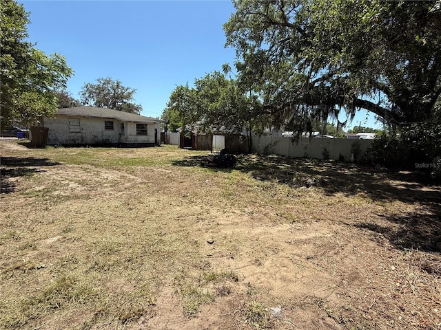 view of yard featuring fence