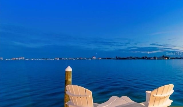1140 Boca Ciega Isle Dr, St Pete Beach, FL 33706 - dock featuring a water view
