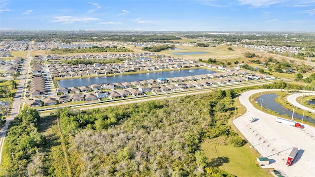 aerial view with a residential view and a water view