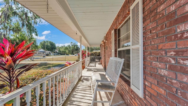 balcony featuring covered porch