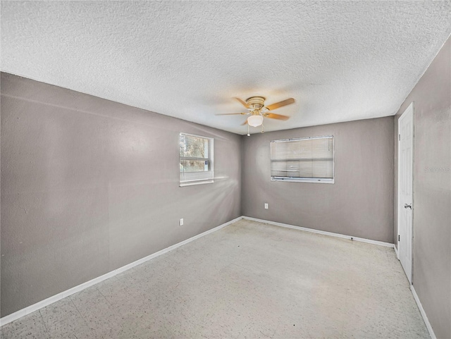 1720 Kendrick Ln, Lakeland, FL 33805 - unfurnished room featuring a textured ceiling, ceiling fan, and baseboards