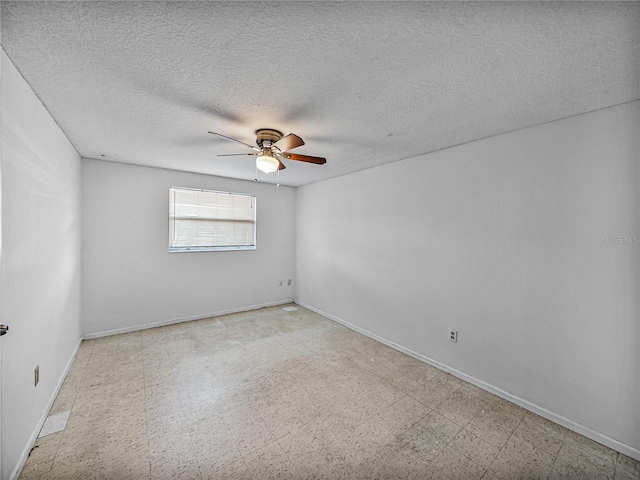 1720 Kendrick Ln, Lakeland, FL 33805 - unfurnished room featuring tile patterned floors, a textured ceiling, a ceiling fan, and baseboards