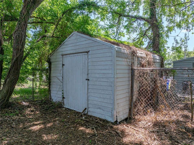 1720 Kendrick Ln, Lakeland, FL 33805 - view of shed featuring fence