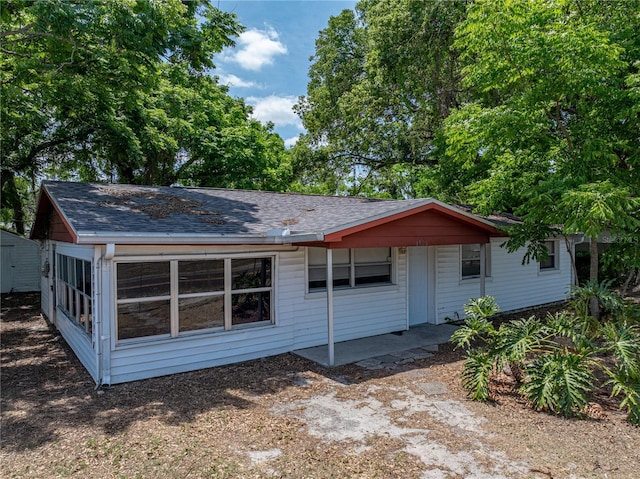 1720 Kendrick Ln, Lakeland, FL 33805 - back of property with a shingled roof